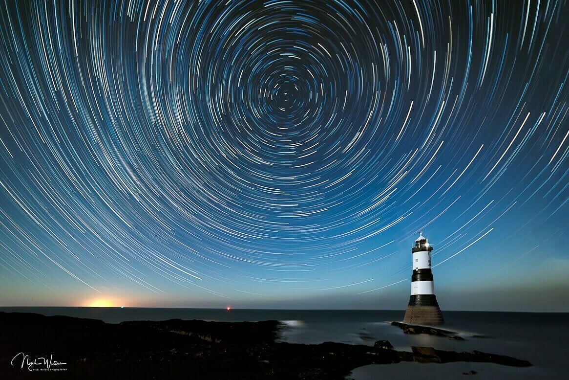 Star trails over Penmon Point Anglesey Wales